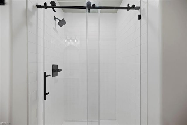 interior details with a shower stall