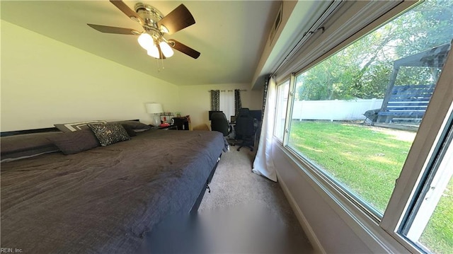 7045 Doummar Dr, Norfolk, VA 23518 - bedroom with baseboards, vaulted ceiling, and a ceiling fan