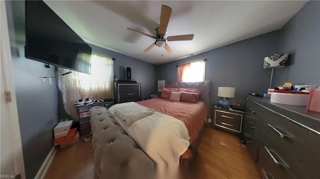 7045 Doummar Dr, Norfolk, VA 23518 - bedroom with wood finished floors and a ceiling fan