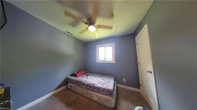 7045 Doummar Dr, Norfolk, VA 23518 - carpeted bedroom with baseboards and a ceiling fan