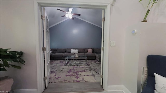 7045 Doummar Dr, Norfolk, VA 23518 - interior space featuring a ceiling fan, lofted ceiling, wood finished floors, and baseboards