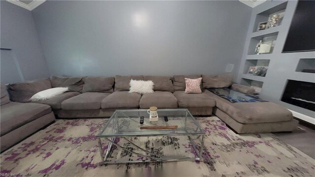 7045 Doummar Dr, Norfolk, VA 23518 - living room with built in features and crown molding