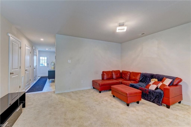 living area featuring recessed lighting, visible vents, carpet flooring, and baseboards