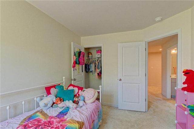 carpeted bedroom with a closet