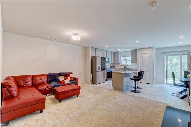 living area with recessed lighting