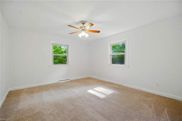 unfurnished room featuring carpet and a healthy amount of sunlight
