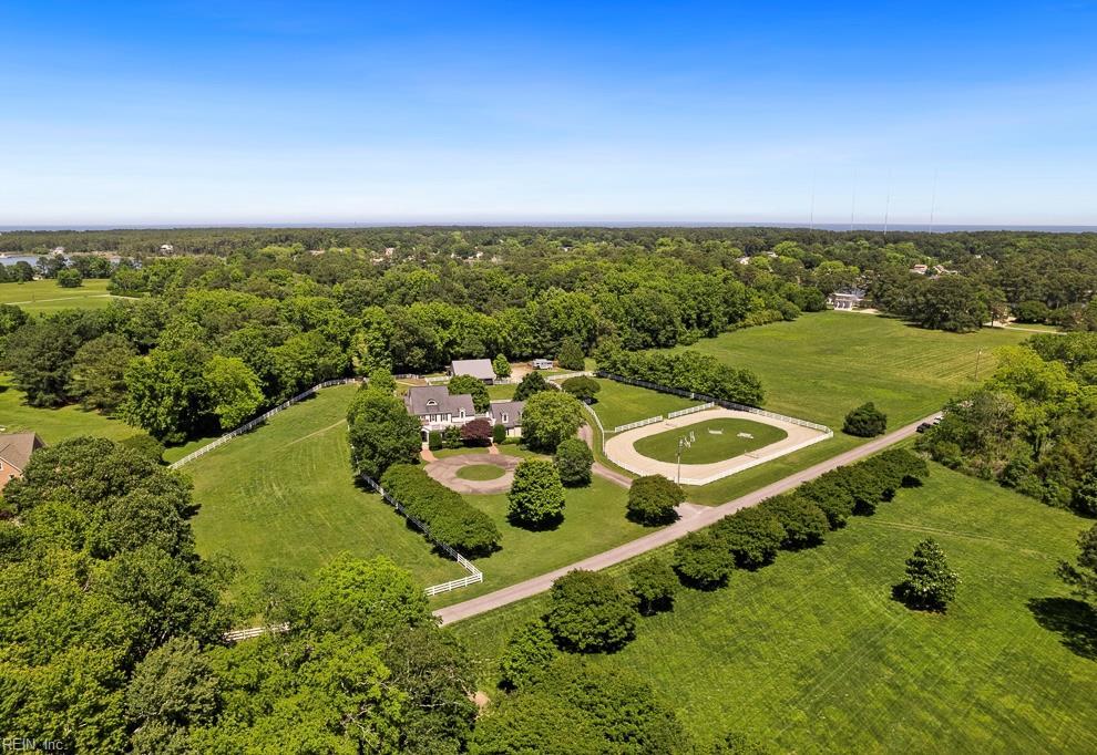 drone / aerial view featuring a view of trees