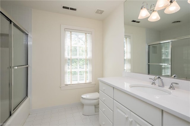 full bathroom featuring a wealth of natural light, toilet, tile patterned floors, and visible vents