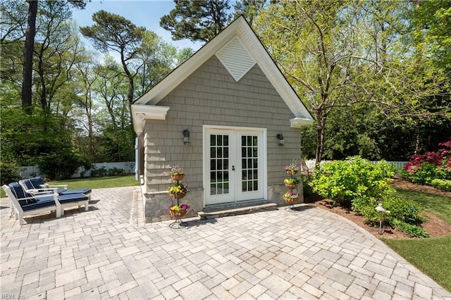 view of outdoor structure with french doors