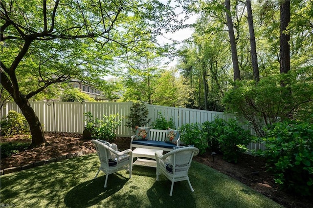 view of yard with a fenced backyard