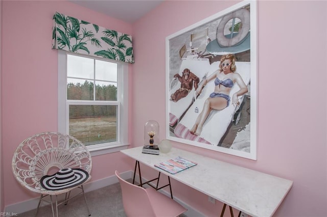 office space with baseboards