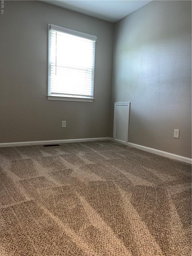 420 Cottonwood St, Newport News, VA 23608 - empty room with visible vents, carpet, and baseboards
