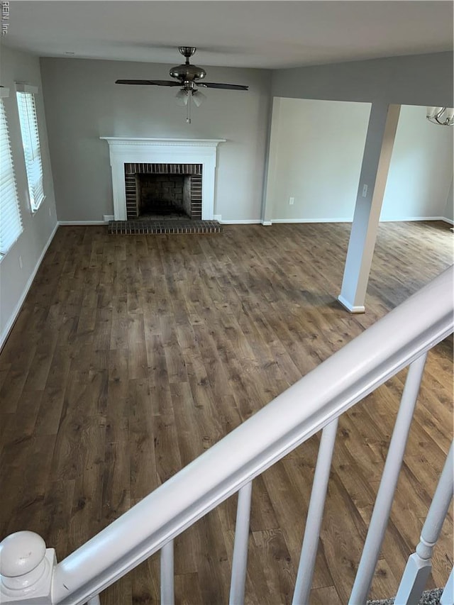 420 Cottonwood St, Newport News, VA 23608 - unfurnished living room featuring a ceiling fan, baseboards, wood finished floors, and a fireplace