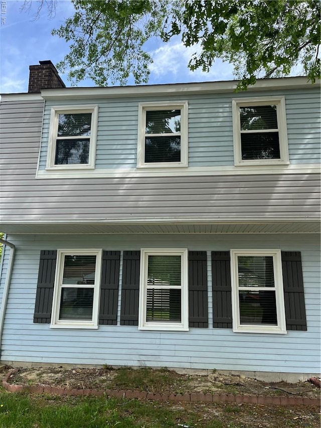 420 Cottonwood St, Newport News, VA 23608 - view of side of home featuring a chimney
