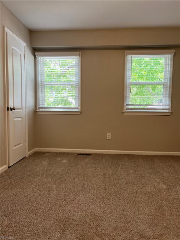 420 Cottonwood St, Newport News, VA 23608 - carpeted spare room featuring visible vents and baseboards