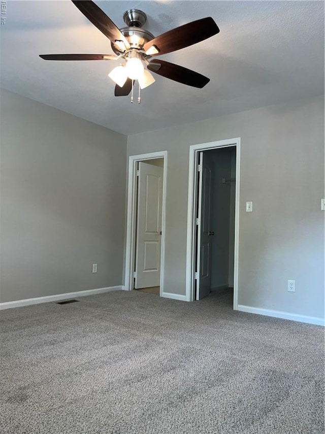 420 Cottonwood St, Newport News, VA 23608 - spare room featuring baseboards, visible vents, a ceiling fan, and carpet