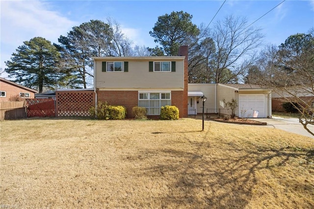 view of front of home featuring concrete driveway, a front lawn, fence, and a garage