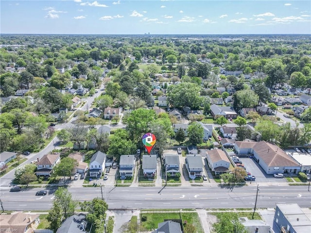 birds eye view of property with a residential view