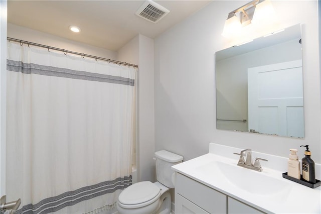 full bath with toilet, vanity, visible vents, and recessed lighting