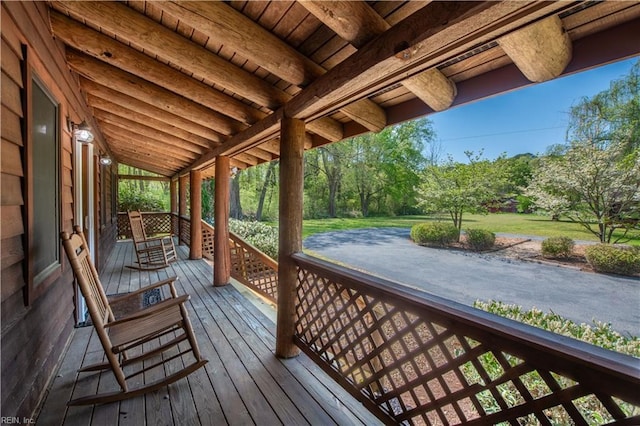 wooden deck featuring covered porch