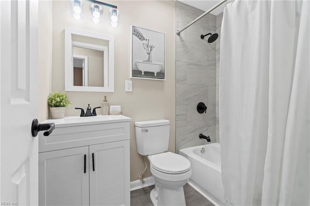 full bathroom with wood finished floors, vanity, shower / tub combo with curtain, baseboards, and toilet