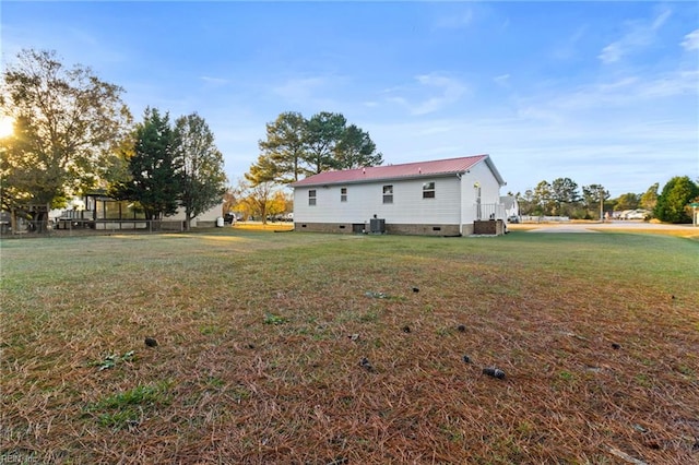 view of yard featuring central AC unit