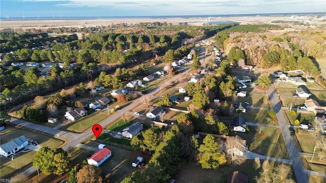 birds eye view of property with a residential view