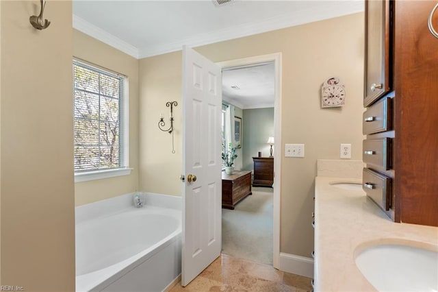 bathroom featuring a bath, crown molding, double vanity, and a healthy amount of sunlight