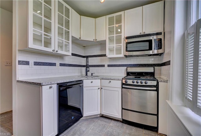 3719 Granby St Unit C-3, Norfolk, VA 23504 - kitchen featuring tasteful backsplash, white cabinetry, stainless steel appliances, and a sink