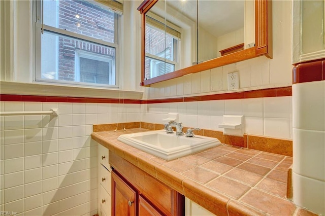 3719 Granby St Unit C-3, Norfolk, VA 23504 - bathroom with tile walls, a wainscoted wall, and vanity