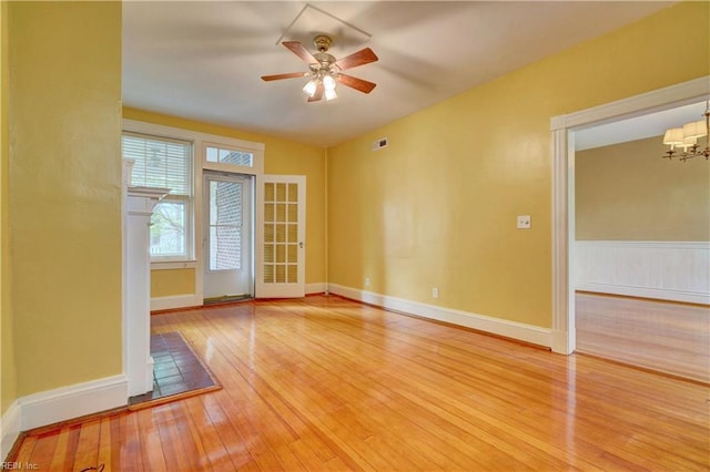 3719 Granby St Unit C-3, Norfolk, VA 23504 - spare room with baseboards, hardwood / wood-style floors, visible vents, and ceiling fan with notable chandelier