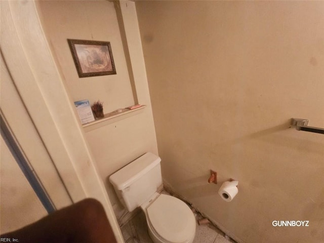 bathroom featuring toilet