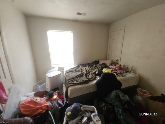 bedroom with visible vents