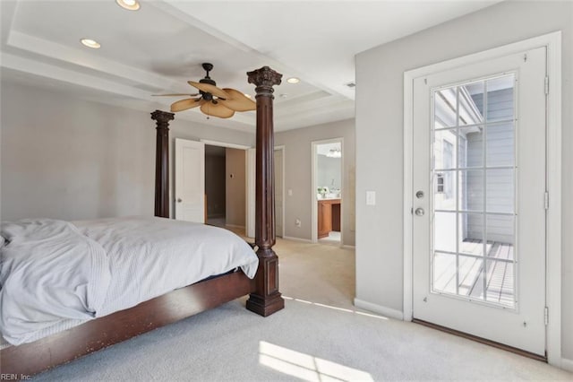 bedroom with recessed lighting, light carpet, multiple windows, and a raised ceiling