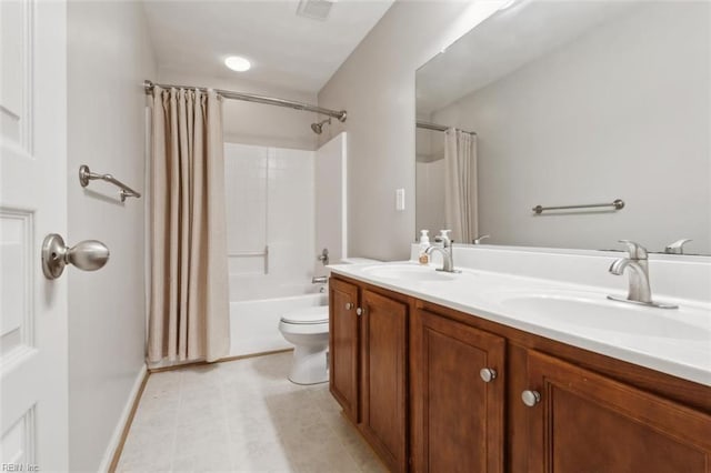 full bathroom featuring shower / bath combo, a sink, double vanity, and toilet