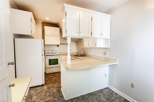 kitchen with a sink, white appliances, light countertops, white cabinets, and a peninsula