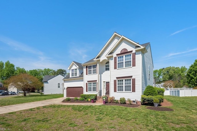 traditional-style home featuring concrete driveway, a front lawn, fence, and a garage