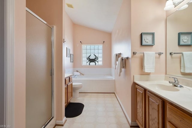bathroom featuring lofted ceiling, vanity, tile patterned floors, and a stall shower
