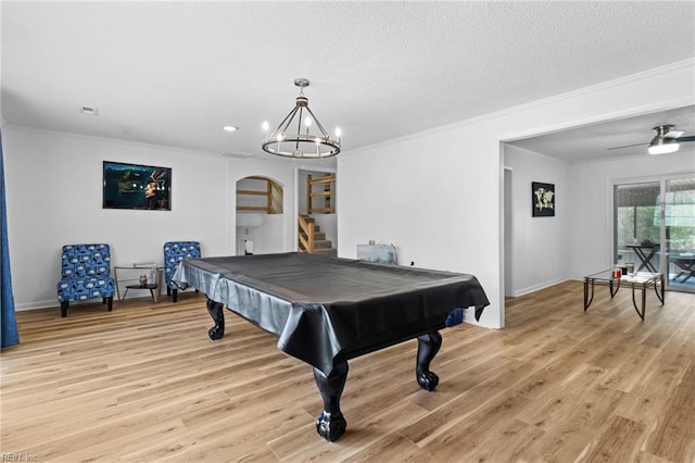 recreation room featuring baseboards, ornamental molding, billiards, and light wood-type flooring