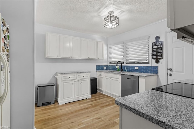 kitchen featuring white cabinets, dishwasher, a textured ceiling, and light wood-style flooring