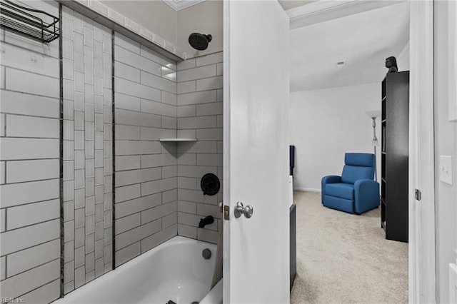 bathroom with crown molding, baseboards, and shower / tub combination