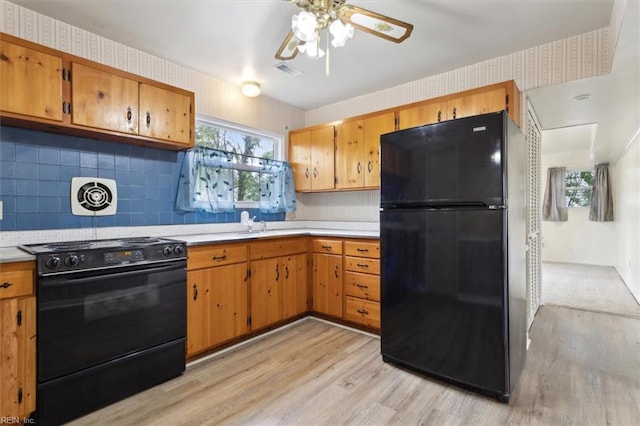 423 Galveston Ct, Hampton, VA 23669 - kitchen featuring black appliances, ceiling fan, light wood finished floors, light countertops, and visible vents
