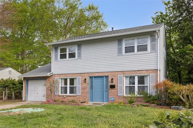 423 Galveston Ct, Hampton, VA 23669 - colonial home with an attached garage, brick siding, driveway, and a front yard