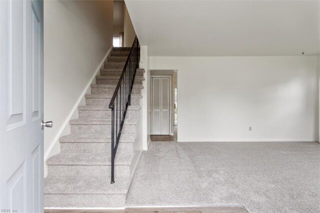 423 Galveston Ct, Hampton, VA 23669 - staircase with baseboards and carpet floors