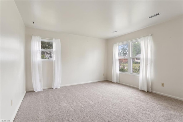 423 Galveston Ct, Hampton, VA 23669 - empty room featuring carpet floors, a healthy amount of sunlight, baseboards, and visible vents