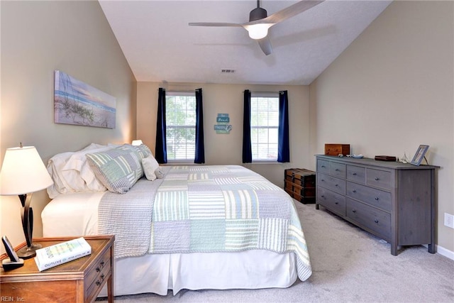 bedroom with ceiling fan, visible vents, baseboards, and light carpet