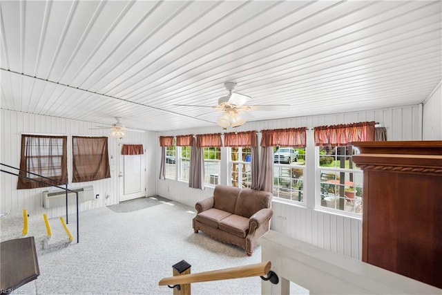 sunroom / solarium with a wall unit AC