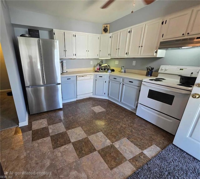 kitchen featuring white appliances, ceiling fan, light countertops, baseboards, and under cabinet range hood