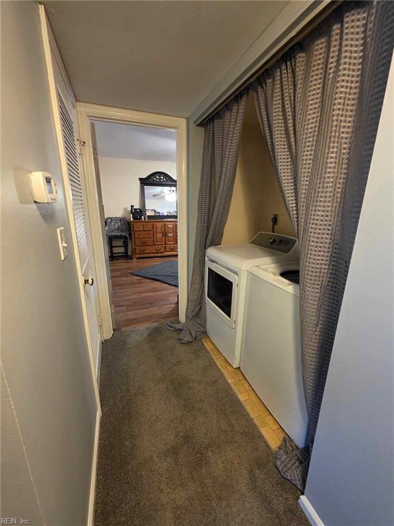 laundry room with independent washer and dryer and laundry area