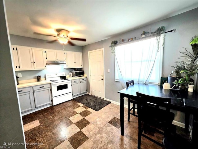 kitchen featuring under cabinet range hood, white range with electric stovetop, light countertops, stainless steel microwave, and ceiling fan
